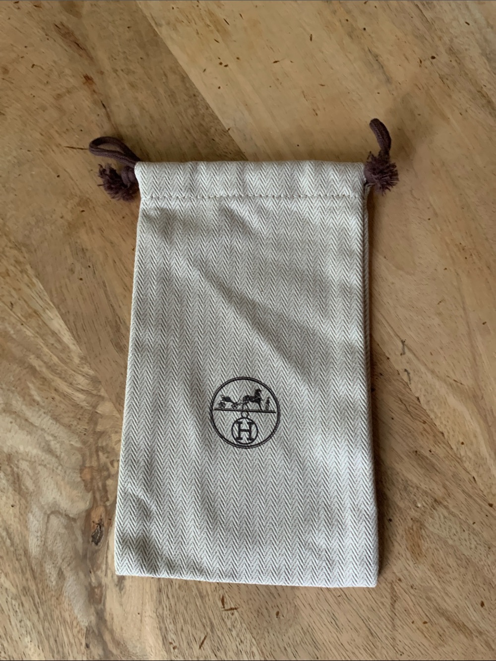 HERMÈS Cream Drawstring Pouch